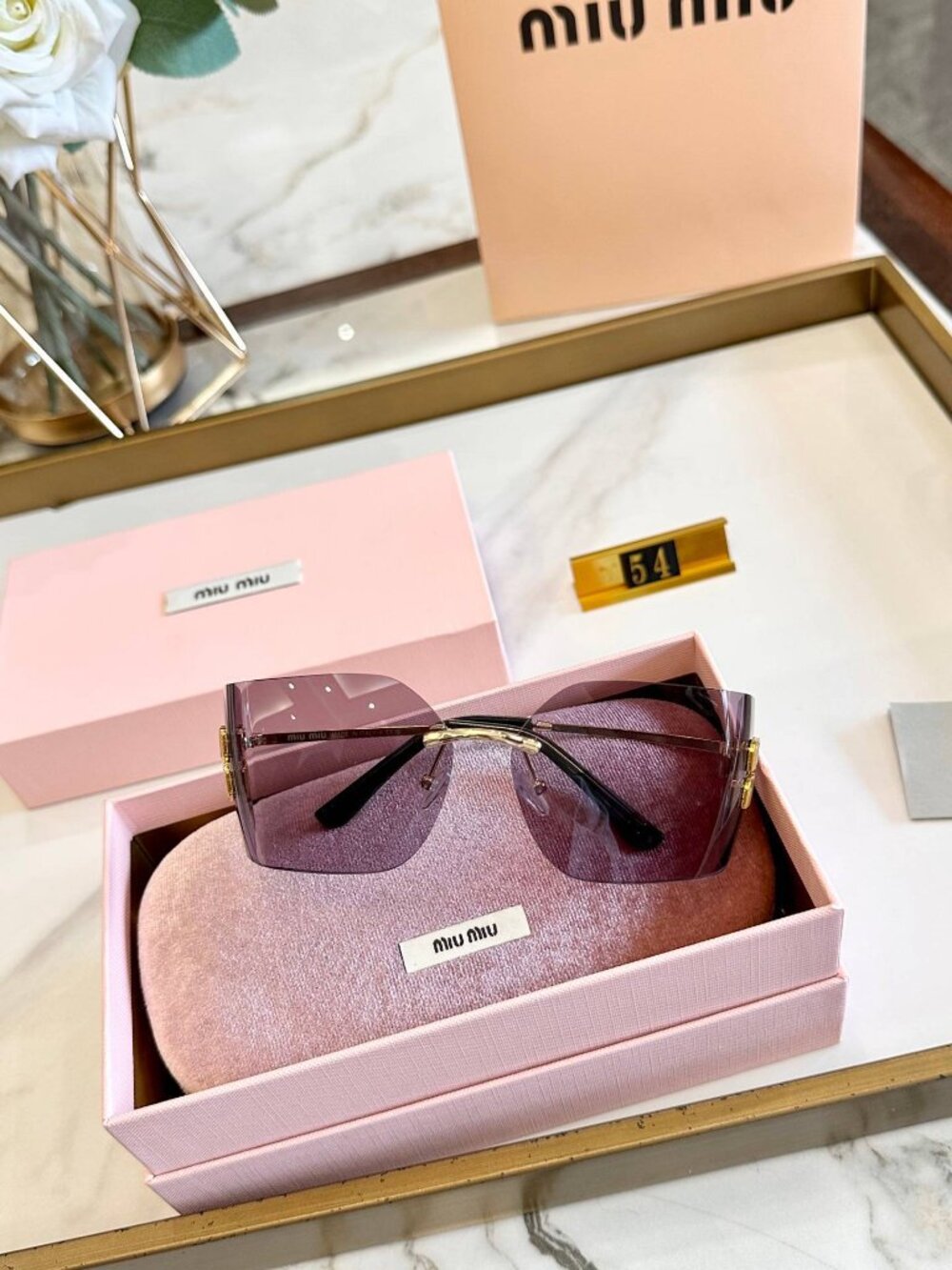 Miu Miu Rimless Oversized Sunglasses